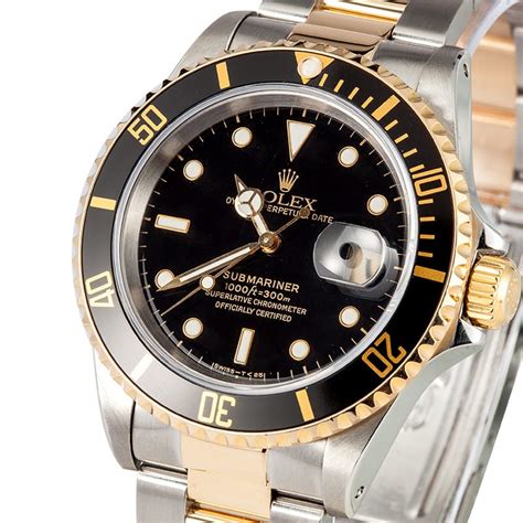 gold rolex black face